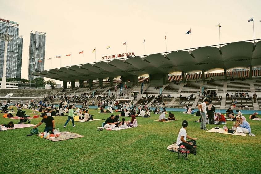 Communal iftar on the field at Stadium Merdeka